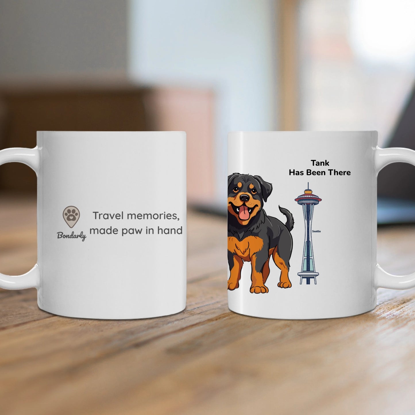 A personalized mug, right hand side with a dog illustration, dog name, "Has Been There" badge, and Seattle's Space Needle illustration, and the left hand side with Bondarly's logo and slogan. World Travel Series.
