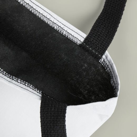 Close-up of the handle stitching of the personalized tote bag